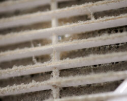 Extremely,dirty,air,ventilation,grill,of,hvac,with,dusty,clogged